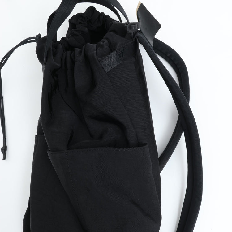 NL/  Com ( Bag )