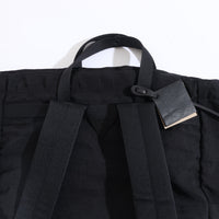 NL/ Com ( Bag )