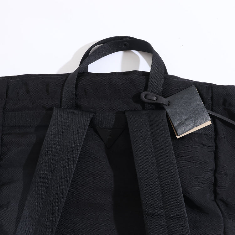 NL/ Com ( Bag )