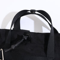 NL/ Com ( Bag )