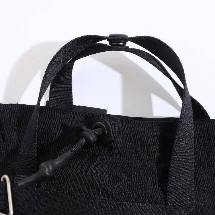 NL/ Com ( Bag )