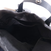 NL/ Com ( Bag )