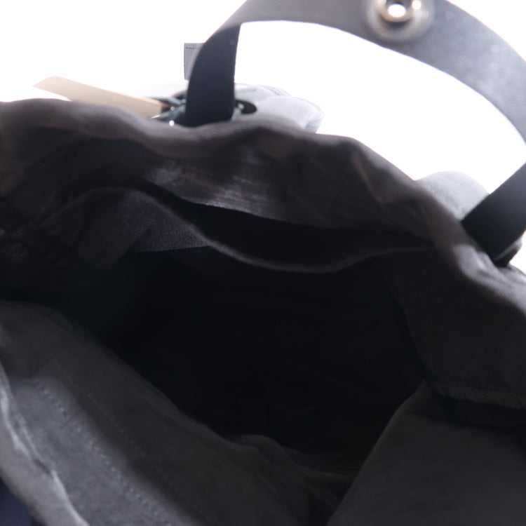 NL/ Com ( Bag )
