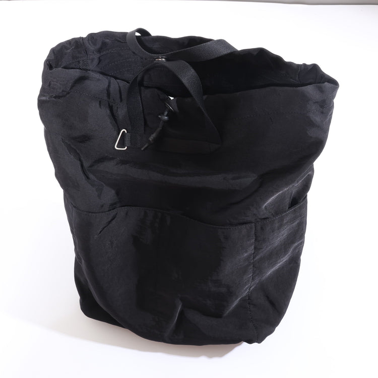 NL/ Com ( Bag )