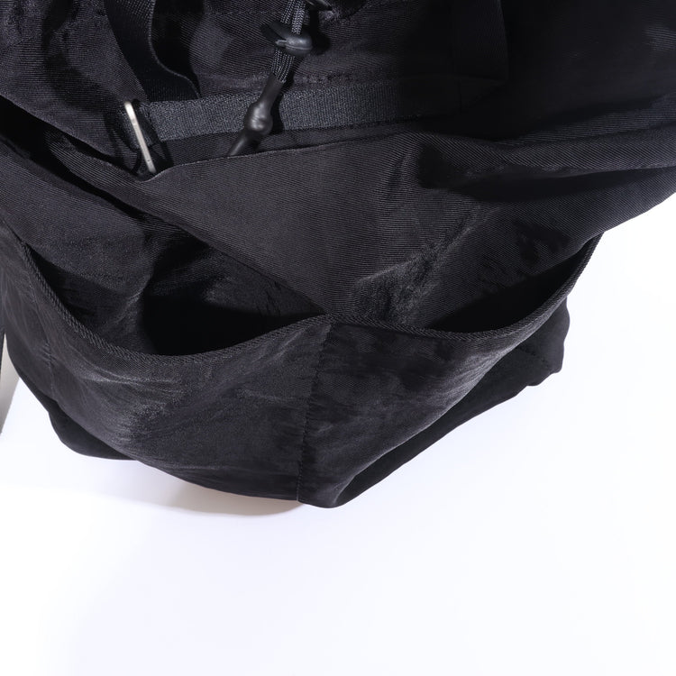 NL/ Com ( Bag )
