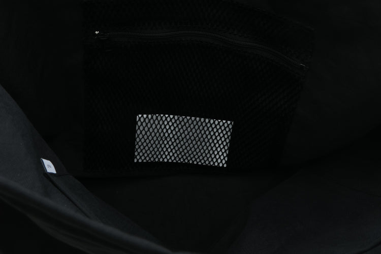 ERA.  TAS BIG RED CROSS APRON BAG BLACK