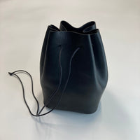 REEL/ Square drawstring bag（スクエア ドローストリング バッグ）