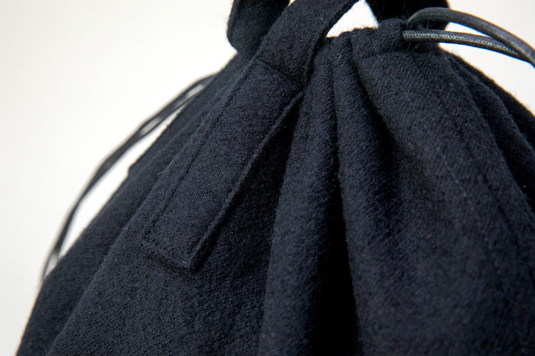 ERA. SHUKUJU WOOL HELMET BAG K010W BLACK