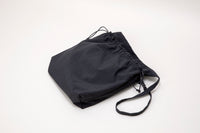 ERA.  TAS BIG RED CROSS APRON BAG BLACK