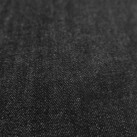 Riprap / TWISTED CREASE JEANS RELAXED-FIT BLACK